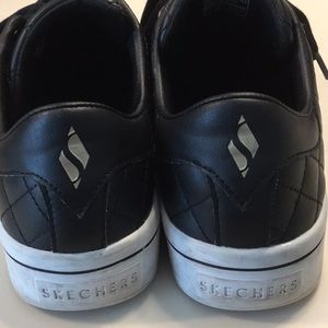 Sketchers black quilted leather sneakers, size 9.